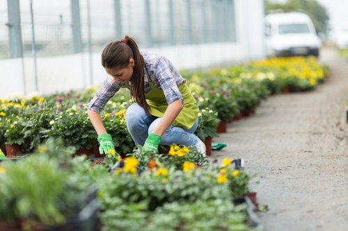 Team member preparing tools for garden maintenance