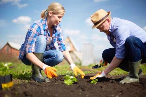 Worker disposing of green waste responsibly
